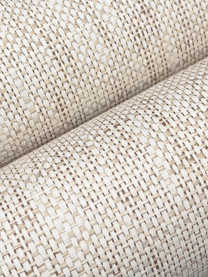 Beige grasscloth wallpaper with a tight woven texture and natural-fiber look.