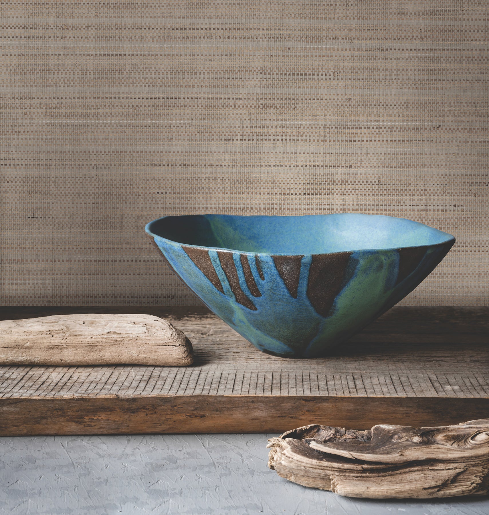 Taupe marled abaca grasscloth wallpaper with a textured, fibrous surface in brown tones.