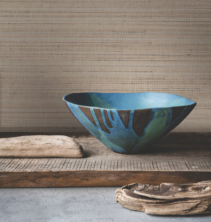 Taupe marled abaca grasscloth wallpaper with a textured, fibrous surface in brown tones.
