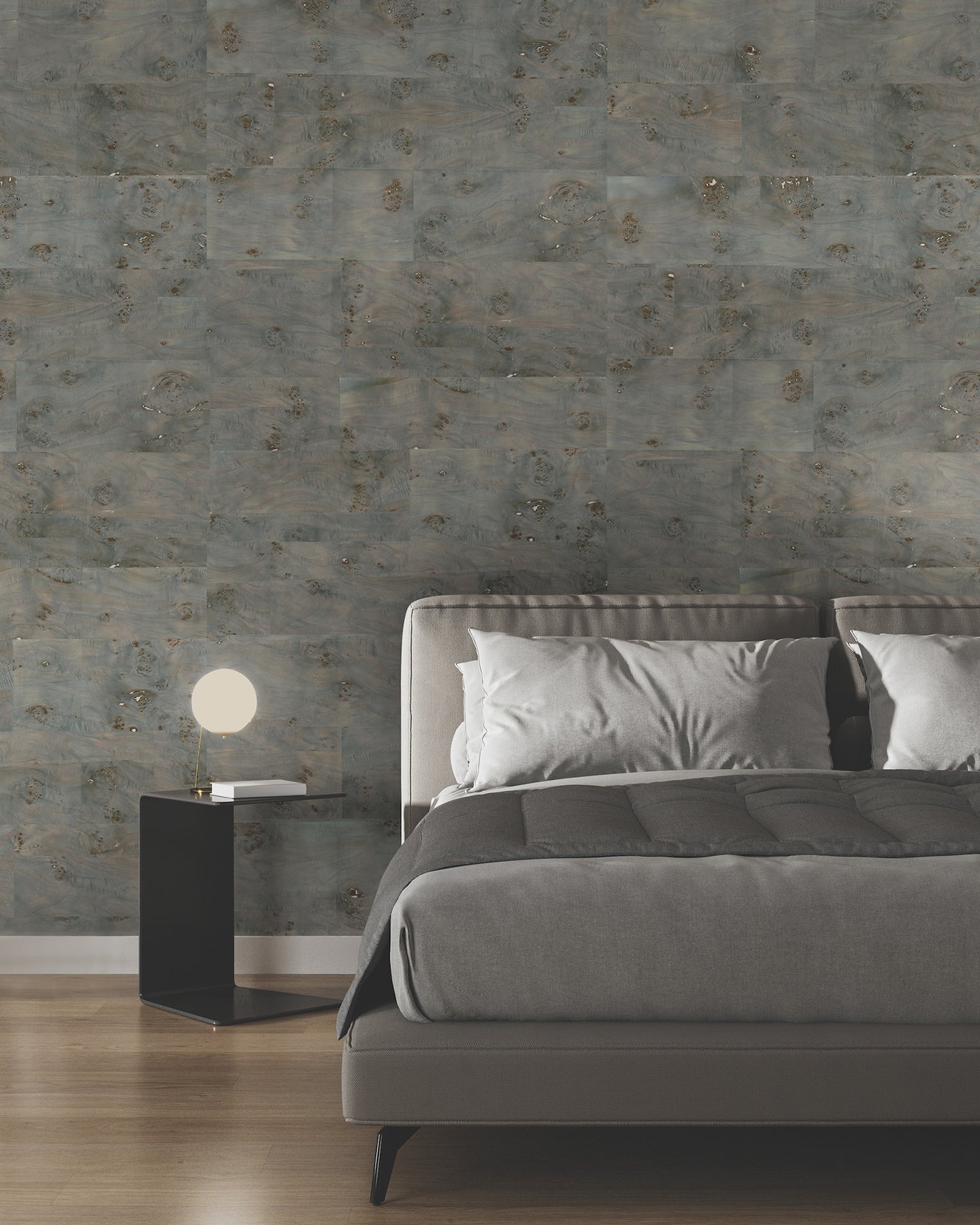 York Wallcoverings Burlwood Smoke wallpaper GV0267 showing natural burlwood wood veneer texture in smoky grey tones with metallic finish, installed on a modern accent wall.