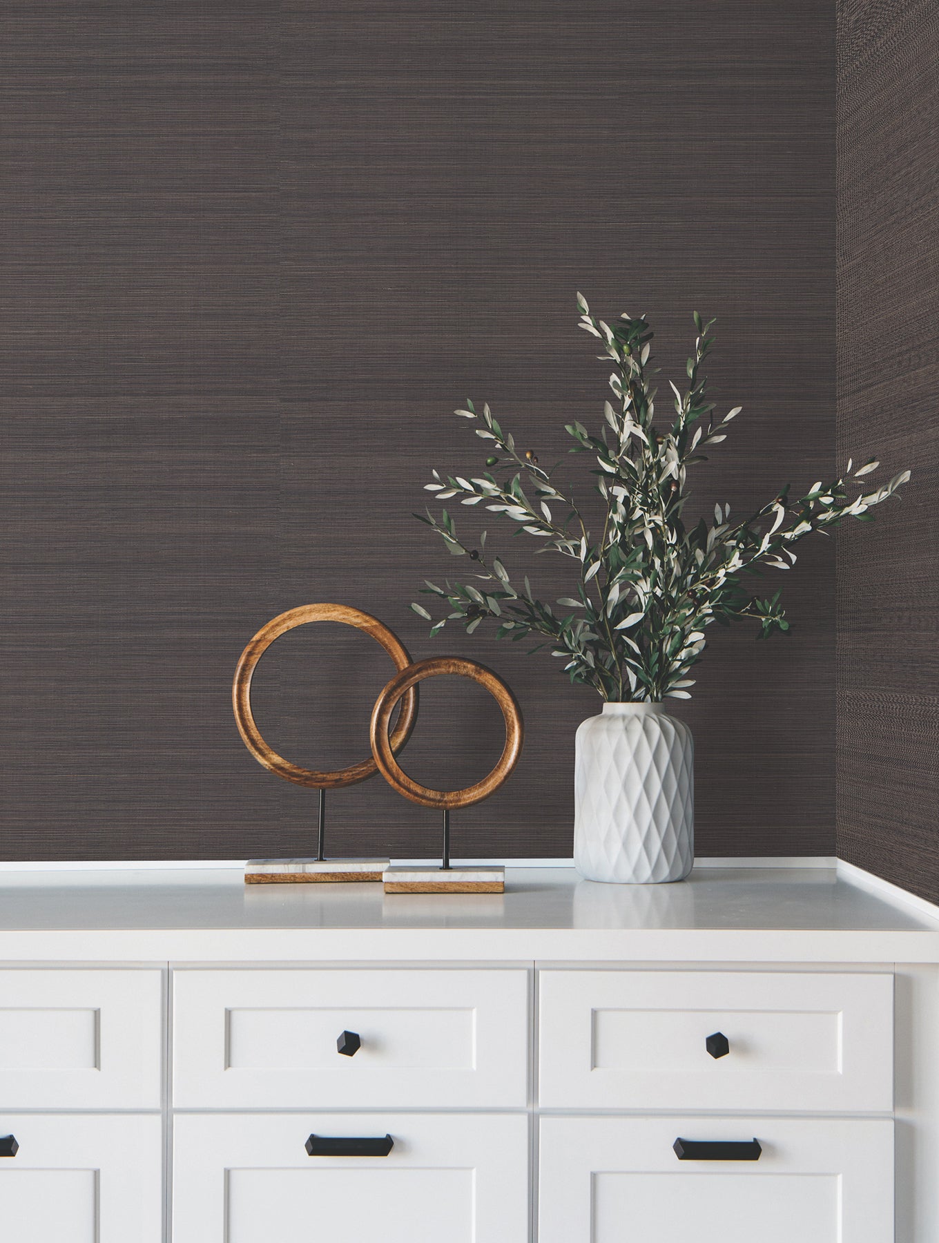Black abaca grasscloth wallpaper with natural fiber texture.