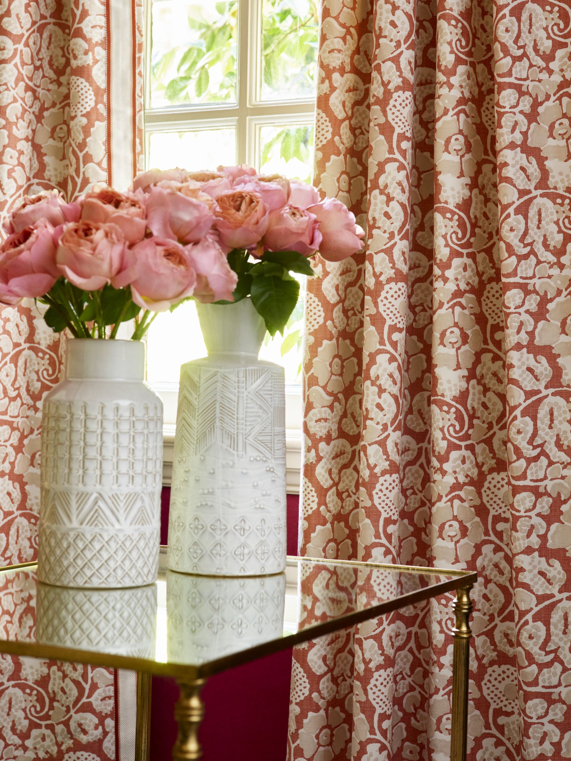 Terracotta Maiden Floral fabric swatch with an intricate floral pattern.