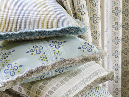 Embroidered fabric in Seabed color with intricate embroidery details.