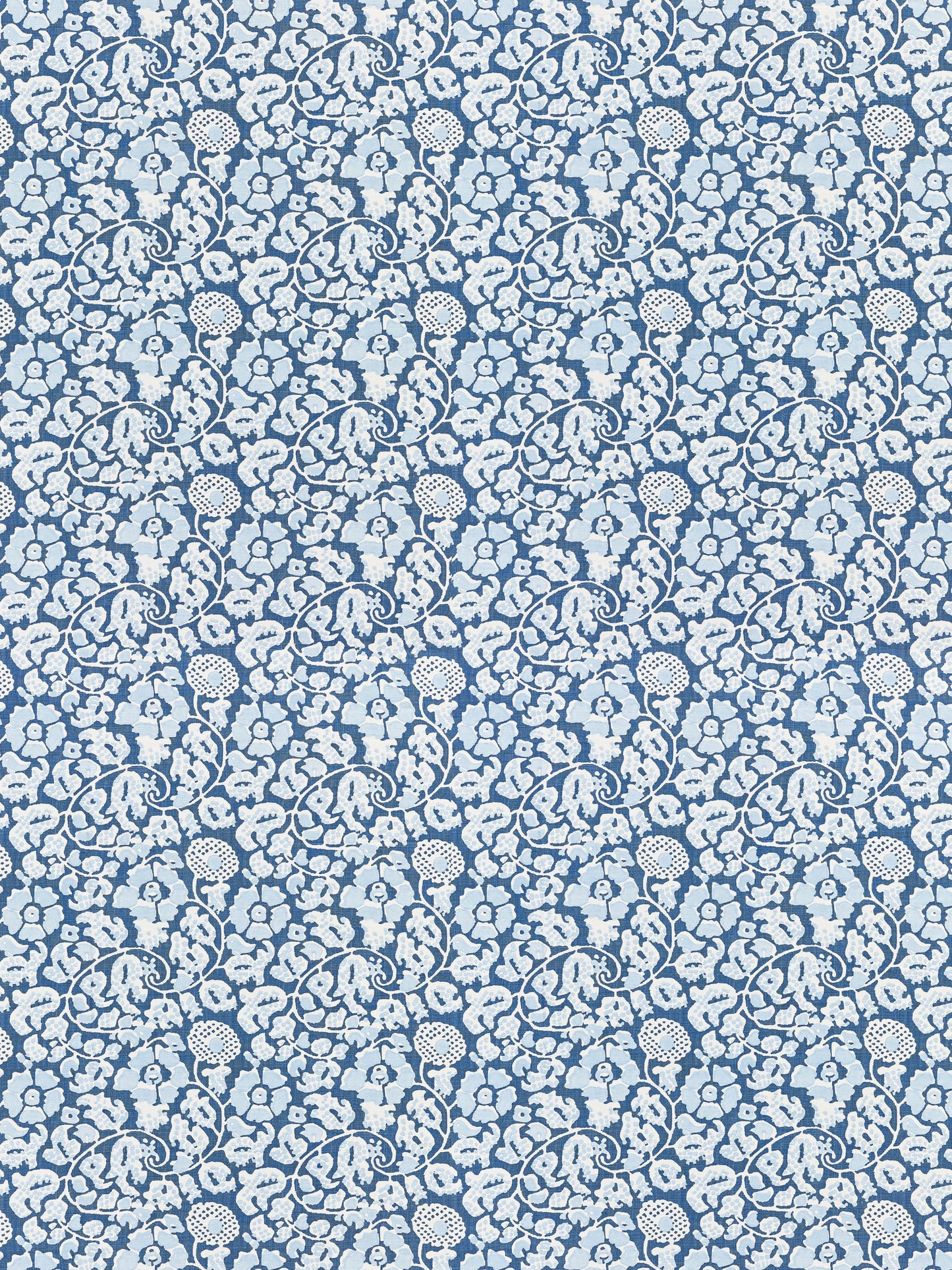 Blue fabric with white damask floral scroll pattern; ornate, repeating motif suitable for upholstery or apparel.