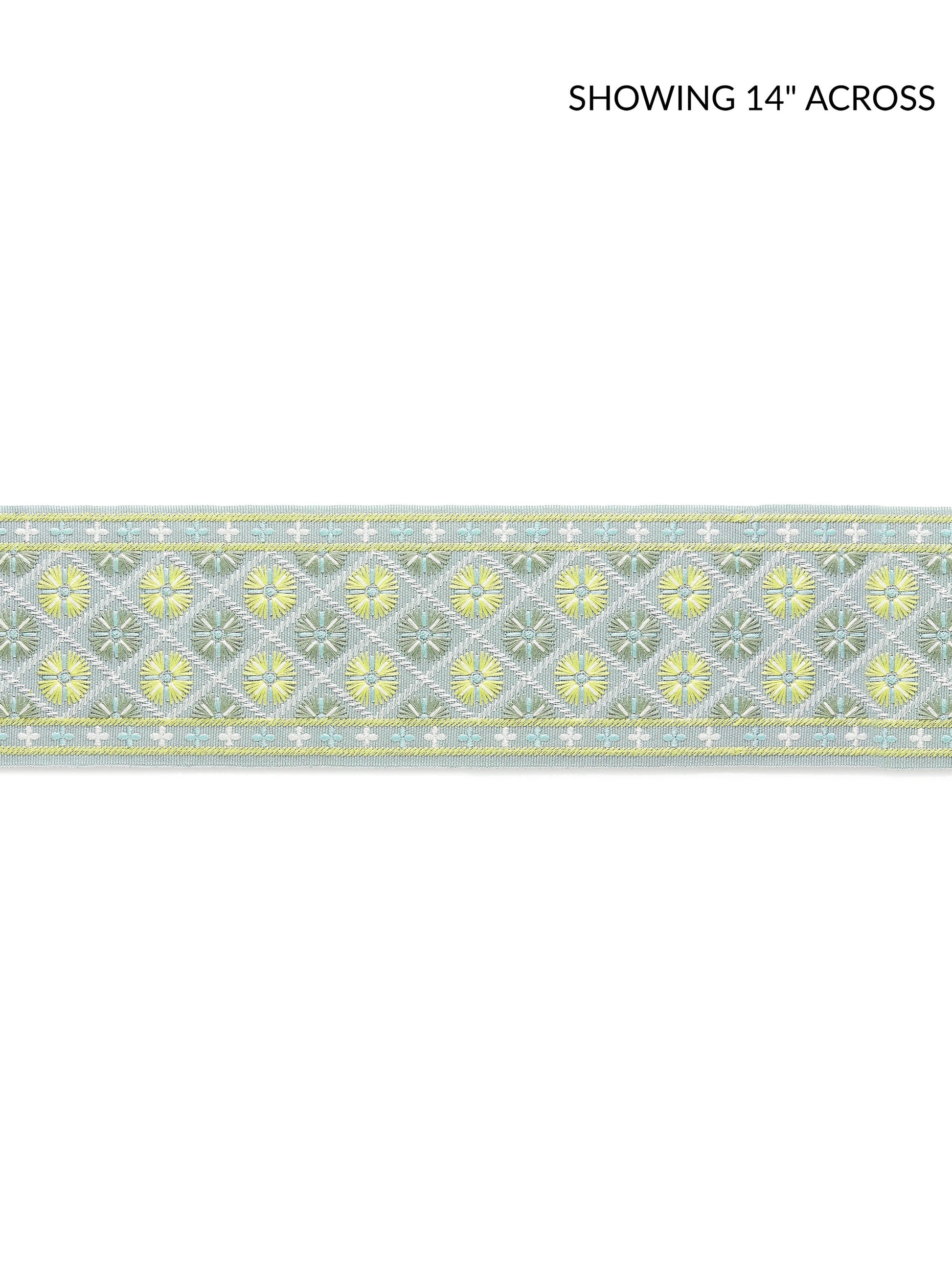 Pastel blue-green embroidered tape fabric trim with repeating yellow floral diamonds & white detailing.