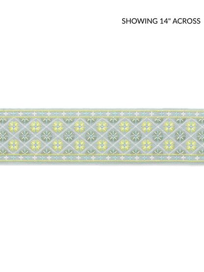 Pastel blue-green embroidered tape fabric trim with repeating yellow floral diamonds & white detailing.