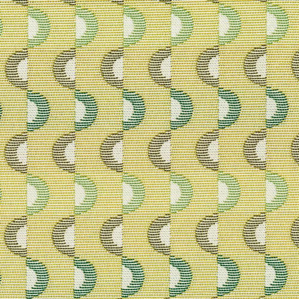 Yellow woven fabric with repeating green and teal crescent shapes in a retro geometric pattern.