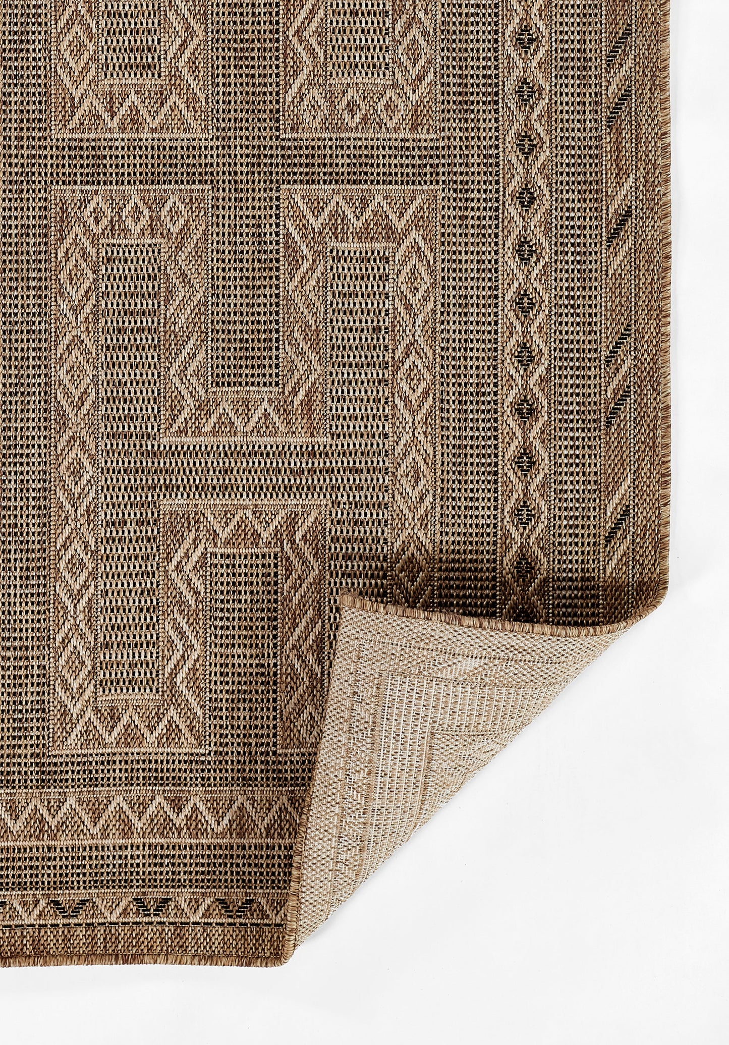 Natural brown and tan geometric flatweave rug with diamond borders, folded corner.