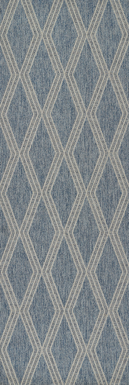Blue denim-like fabric with beige diamond lattice pattern, woven texture for upholstery or home decor.