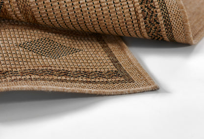 Natural beige jute rug with dark brown woven stripes and a bordered edge; rustic flat-weave rug.