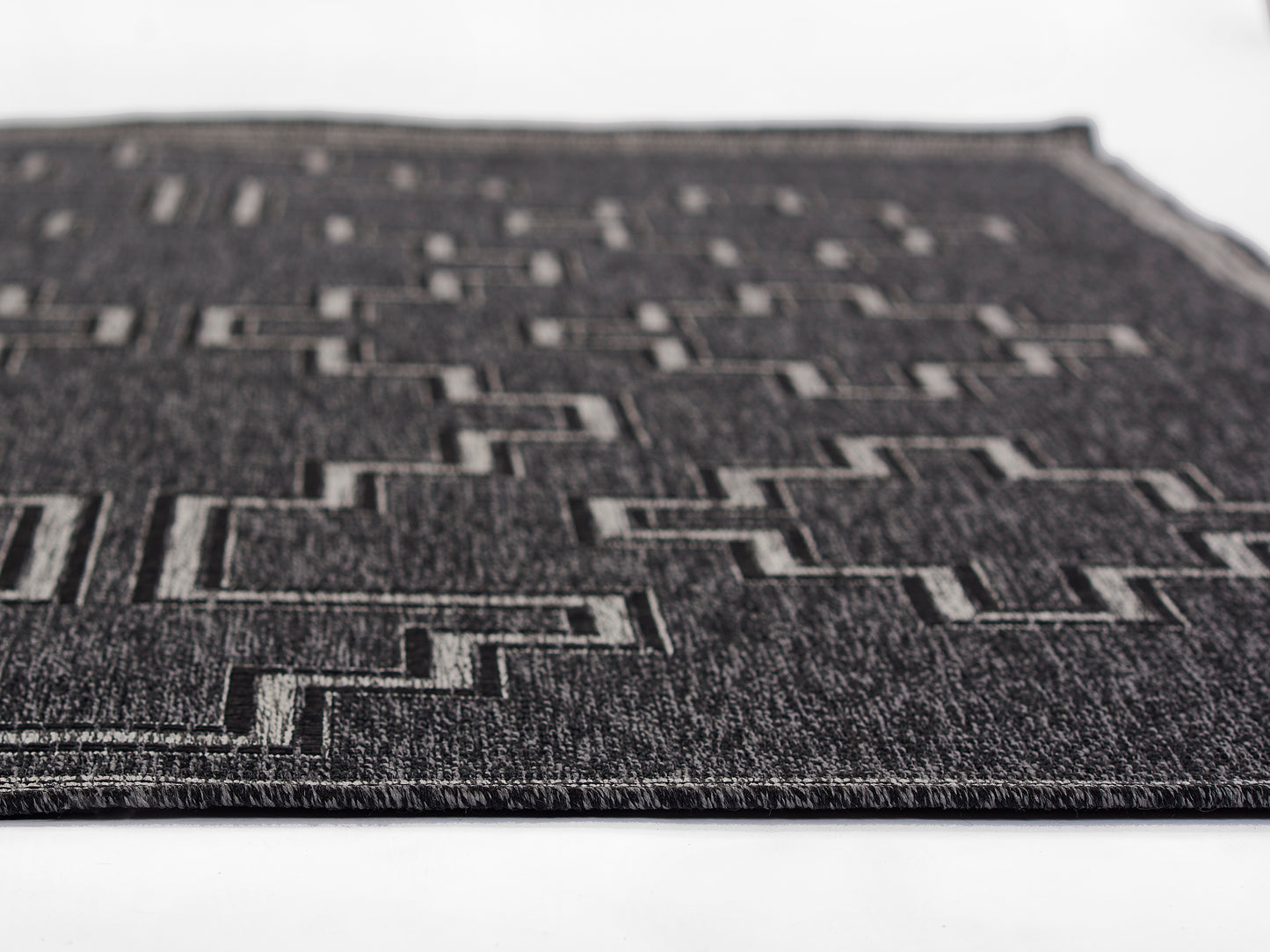 HAMPOHAM-9BLK black geometric rug with stepped rectangular pattern in light gray, flat-weave texture.