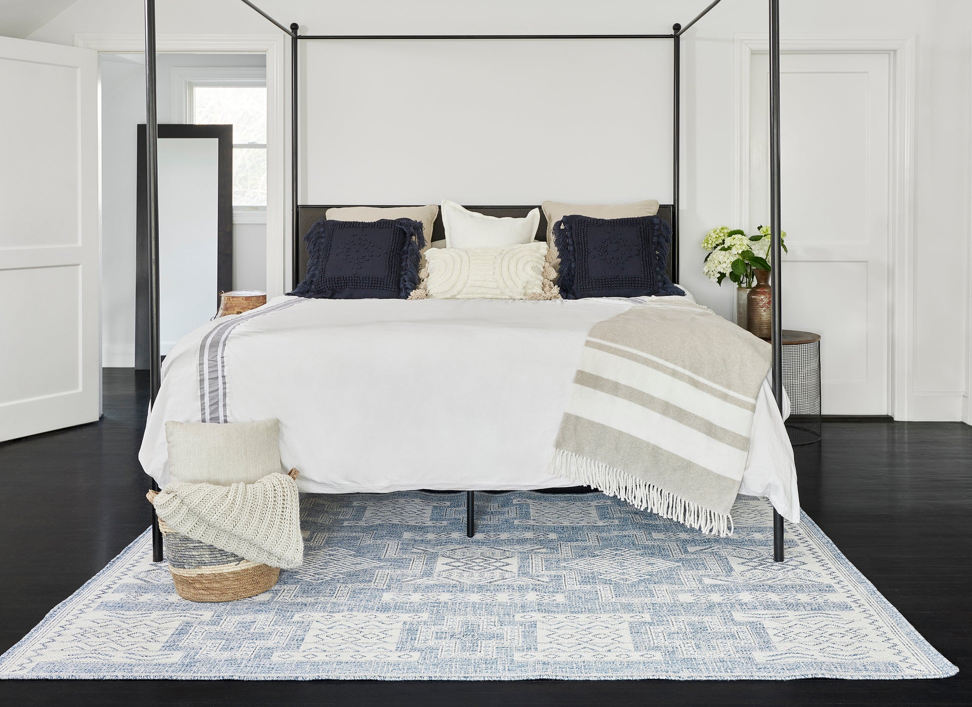 Blue geometric area rug, 8' x 10'.