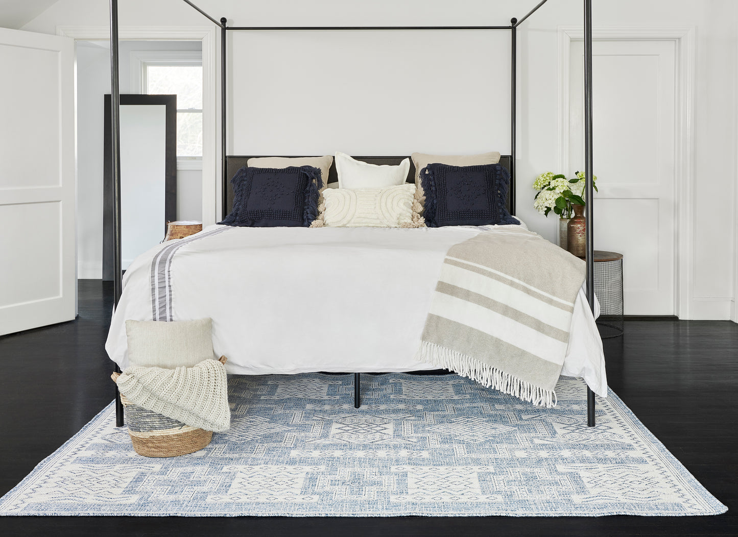 Blue-gray patterned rug.