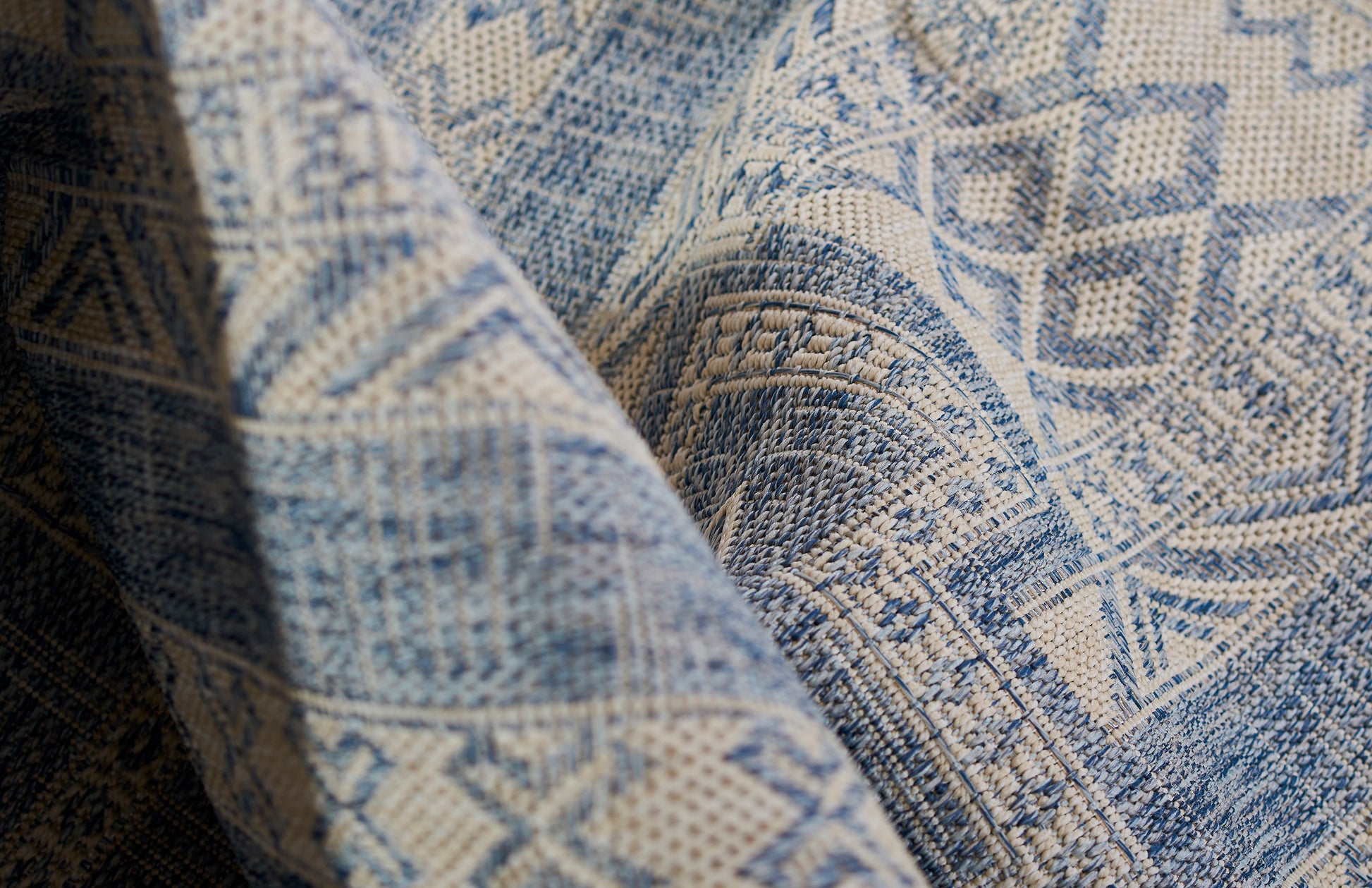 Blue & cream geometric jacquard rug with a textured weave; 8' x 10'.