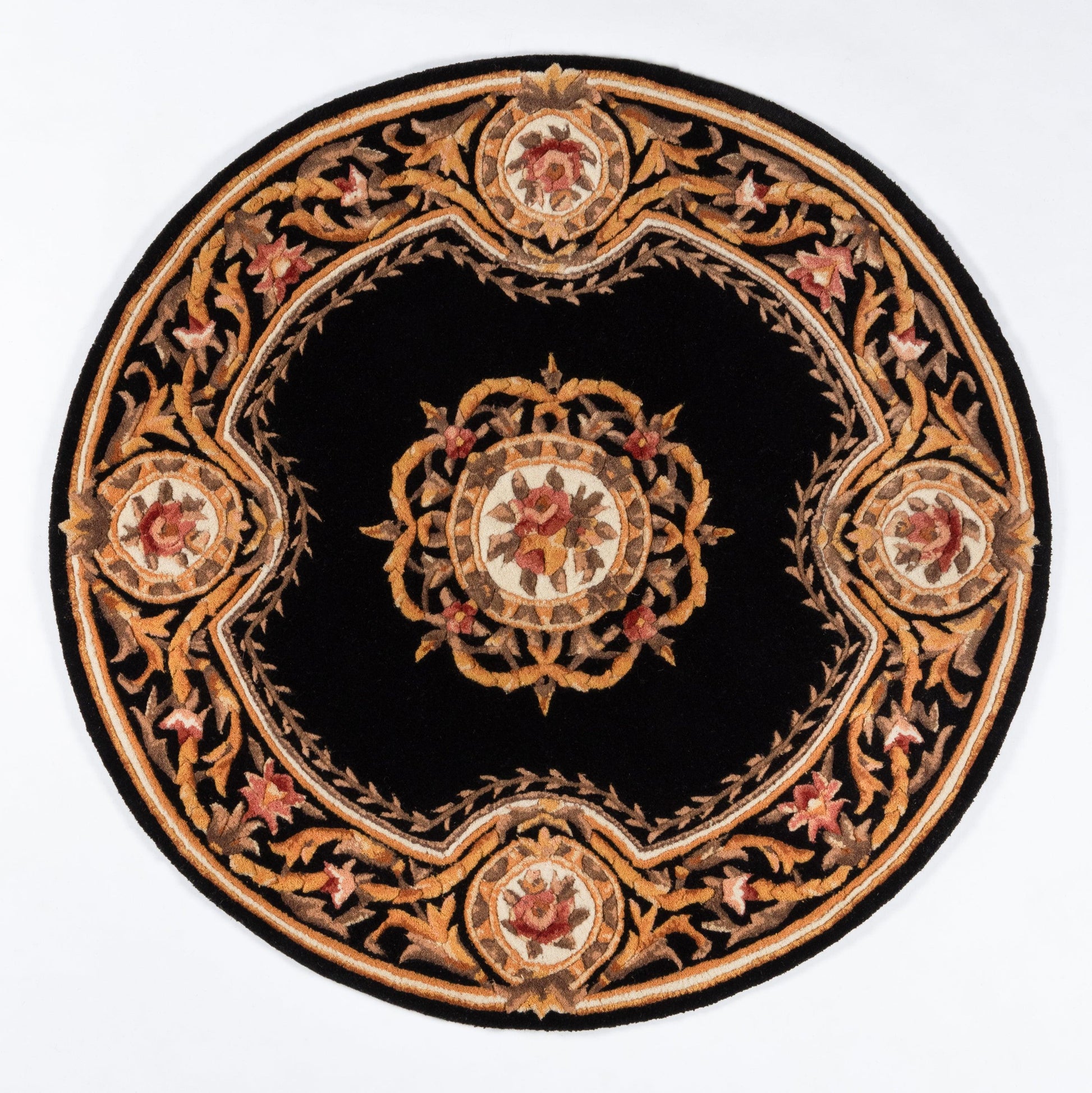 Round black rug with gold-tan ornate border and central medallion, red accents, Persian-inspired design.