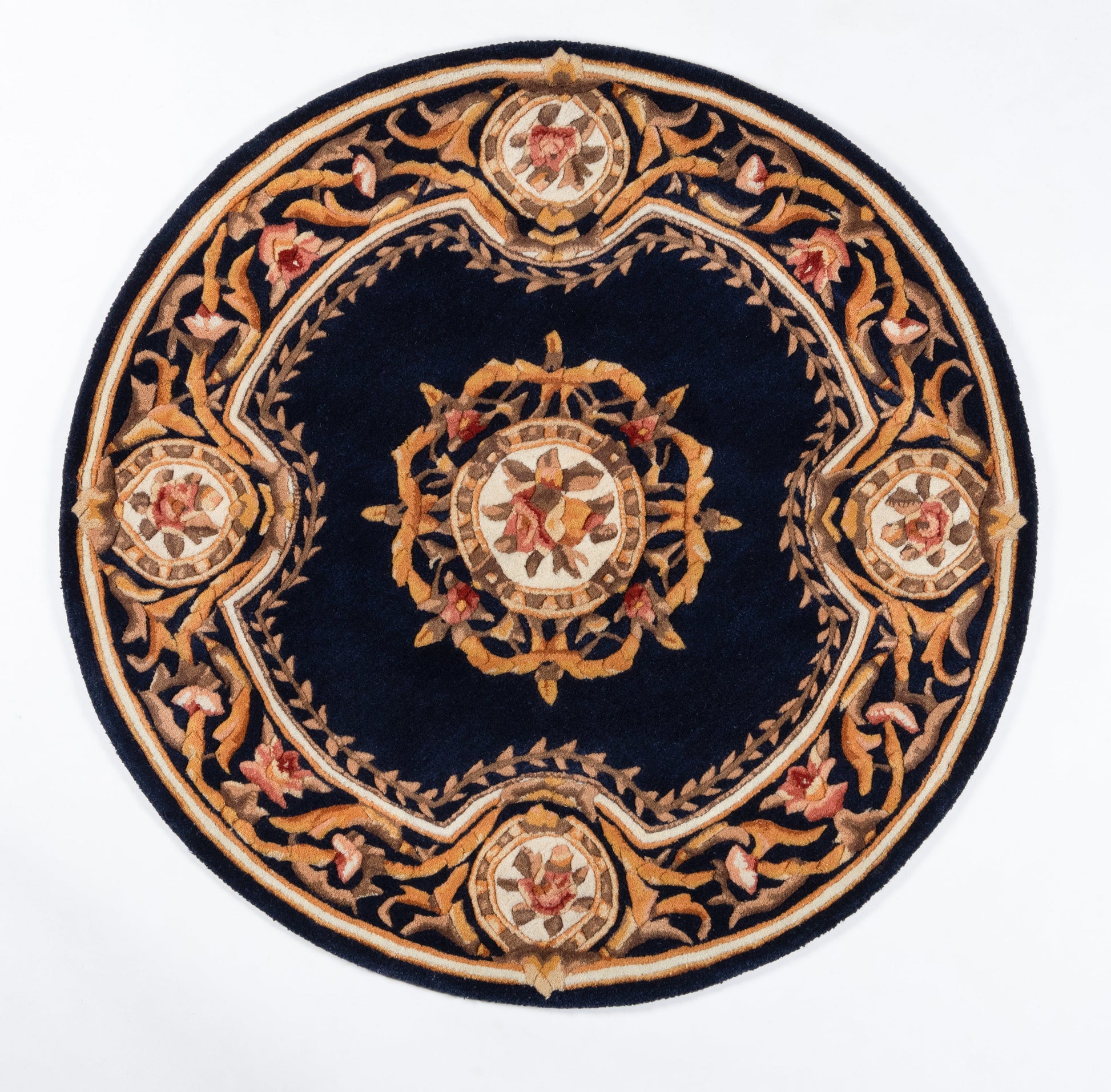 Navy blue rectangular rug with gold and cream floral Baroque motifs and an ornate border; plush wool for decorative floor use, 4' x 6'.