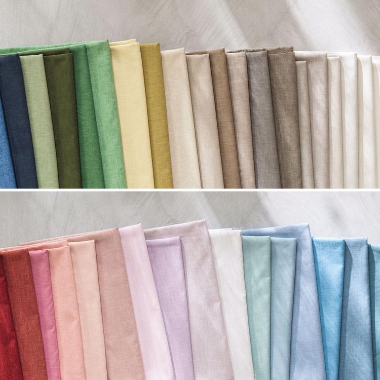 Harlequin Ario textured plain fabric showing soft woven surface drapery quality cotton‑recycled polyester blend available in 38 colourways and wide widths.