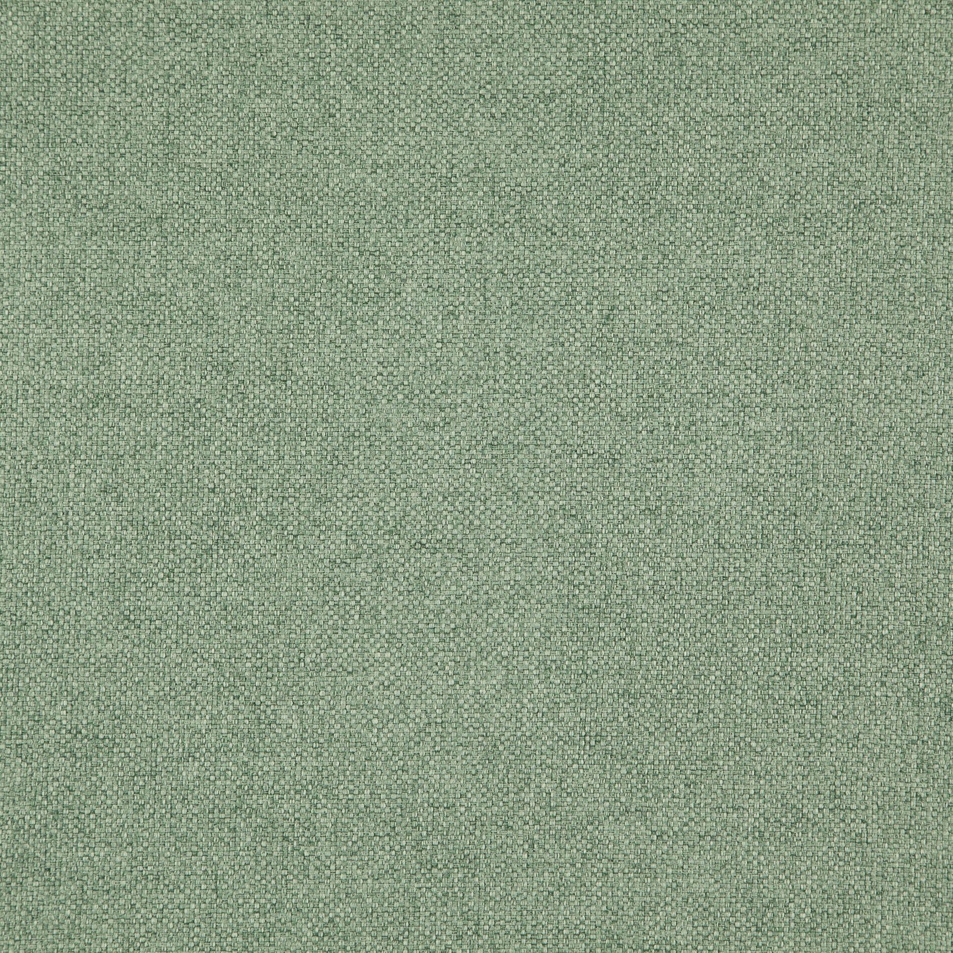 Close-up of sage green woven fabric texture with a tight flecked weave; great for upholstery and decor.