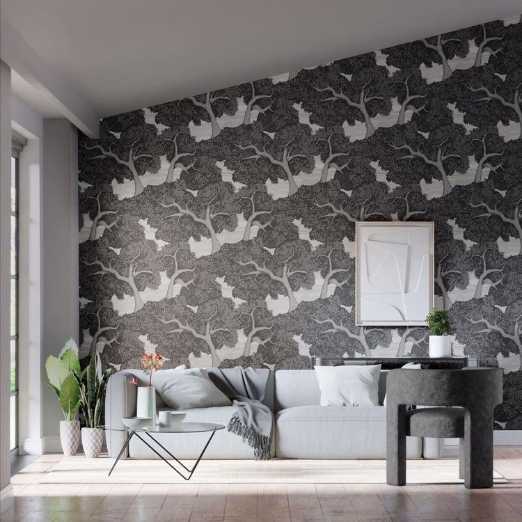 Harlequin Eternal Oak Ebony/First Light wallpaper showcasing hand-painted oak trees and soft clouds in a monochrome palette, perfect for creating a serene accent wall.