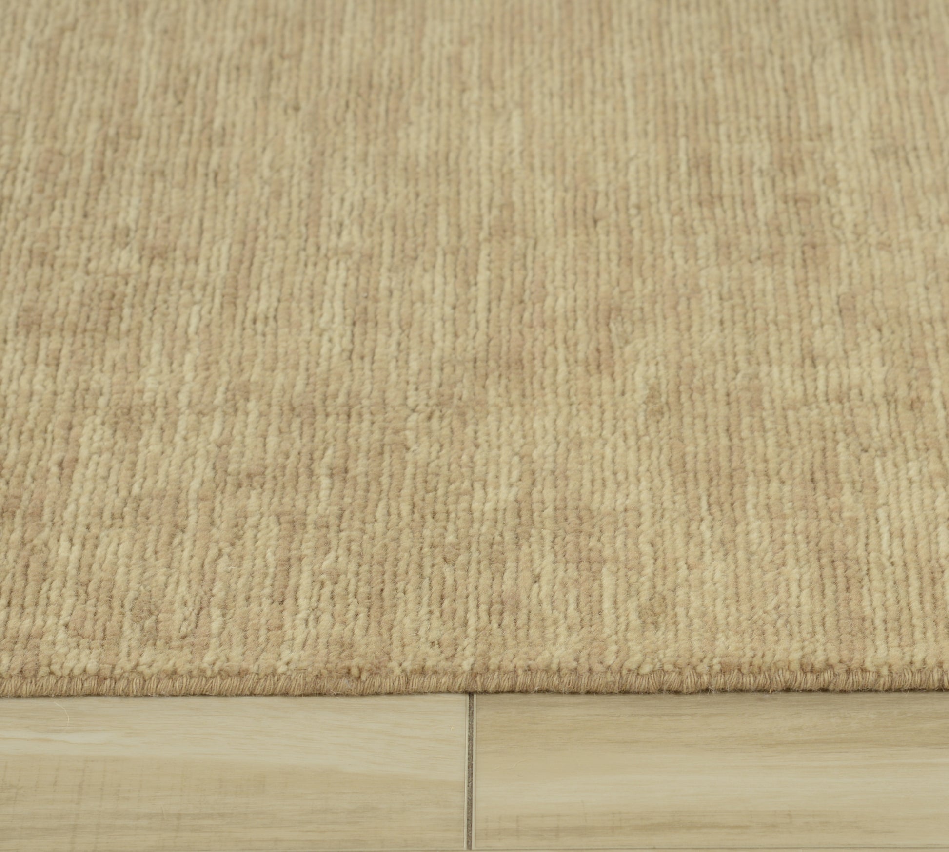 Area rug on floor, 9' x 12', casual style.