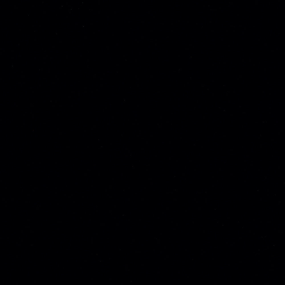 Solid ebony fabric; dark, plain image with minimal lighting.