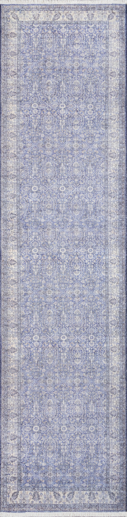 Rectangular blue distressed Persian-style rug with ivory border and floral motifs.