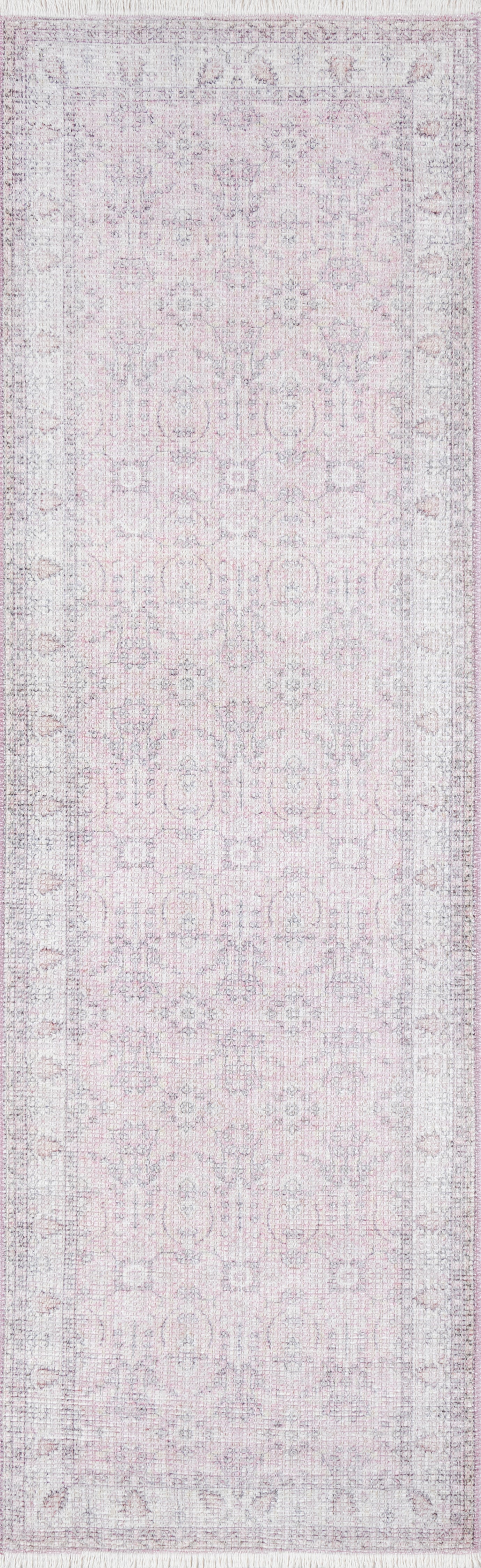 Soft pink distressed runner rug with faded lavender-gray medallion pattern and floral border.