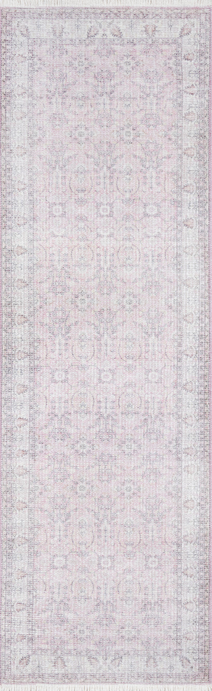 Soft pink distressed runner rug with faded lavender-gray medallion pattern and floral border.