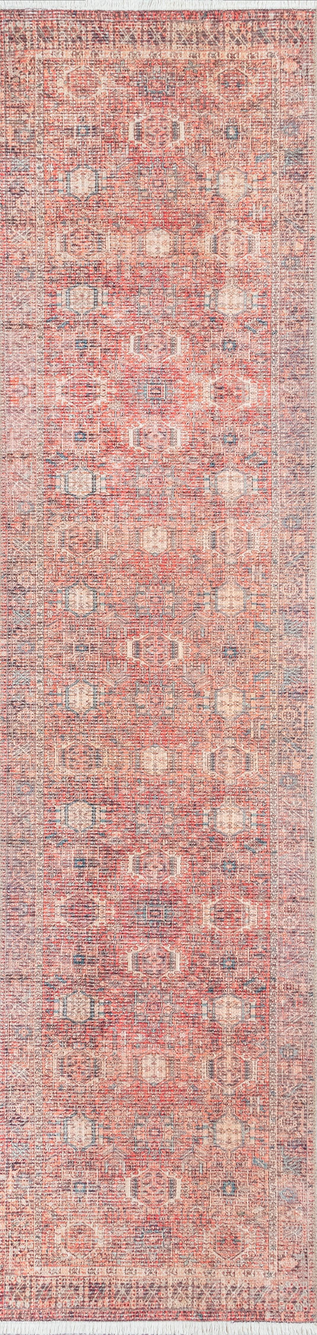 Distressed pink runner rug with ivory and blue geometric medallions; vintage oriental style, wool.