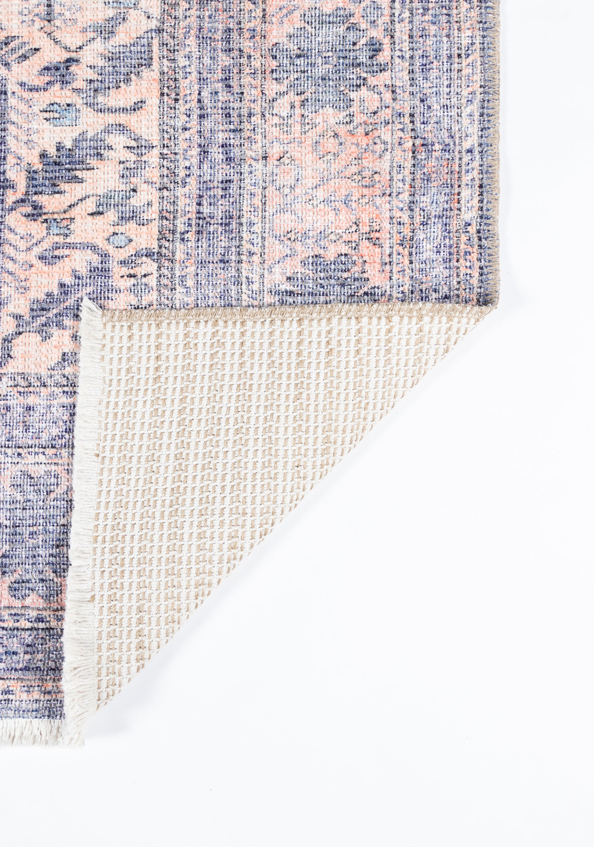 Persian-inspired rectangular runner rug in pink and blue floral print; woven pile with beige backing exposed.