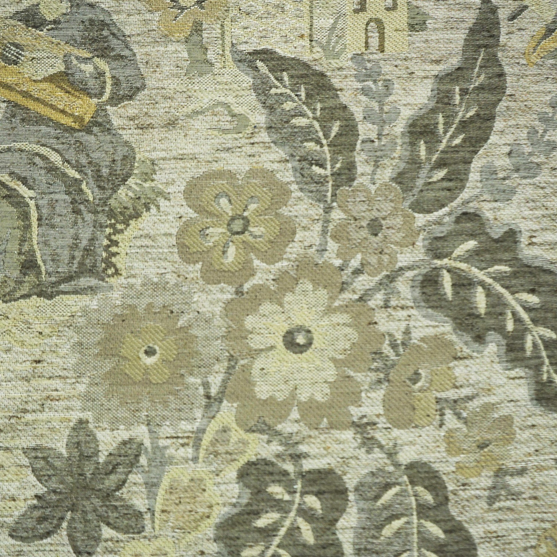 Tapestry-style floral upholstery fabric in muted beige, gray, sage and pale yellow with a textured weave.