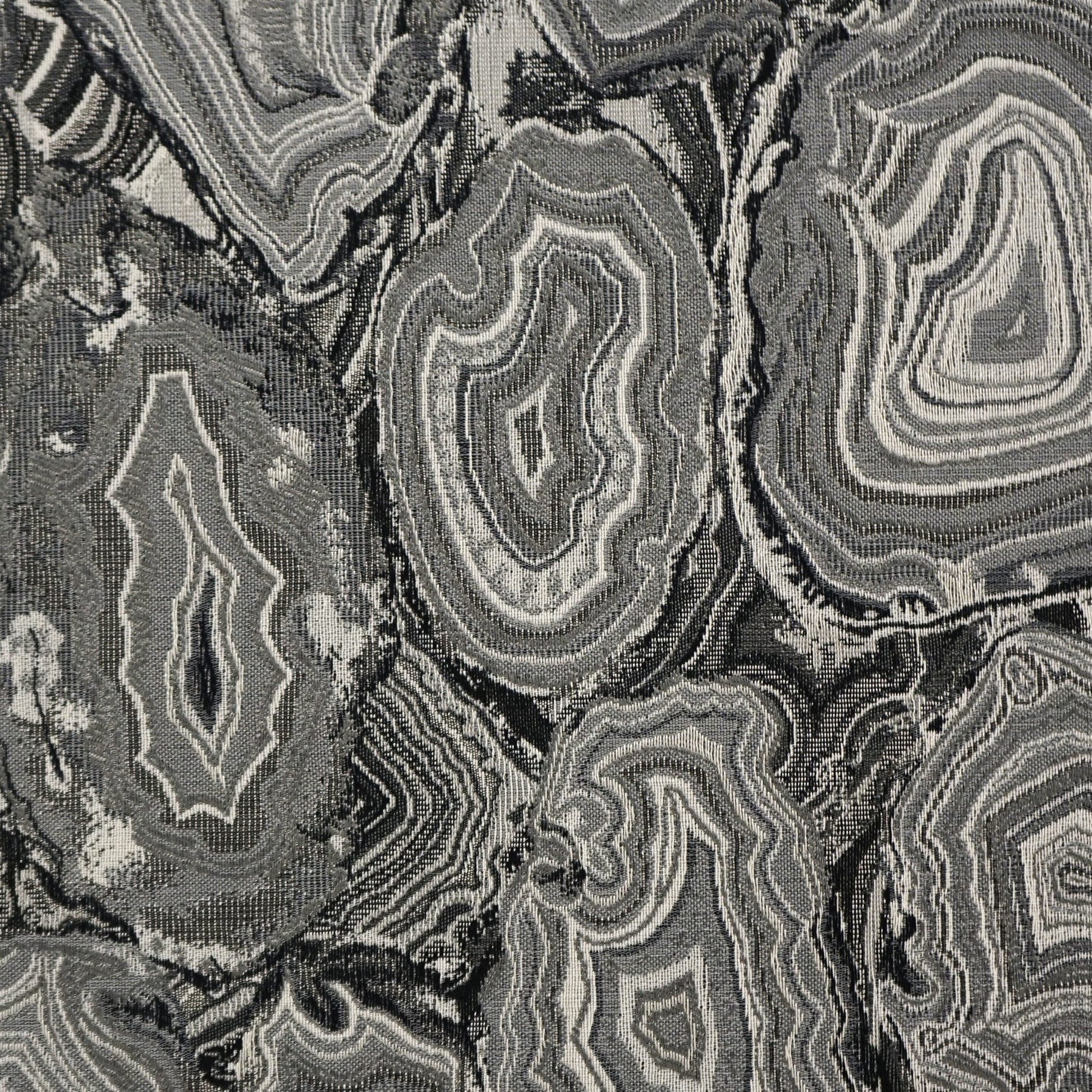 Gray and black geode-patterned jacquard fabric; textured woven textile for upholstery