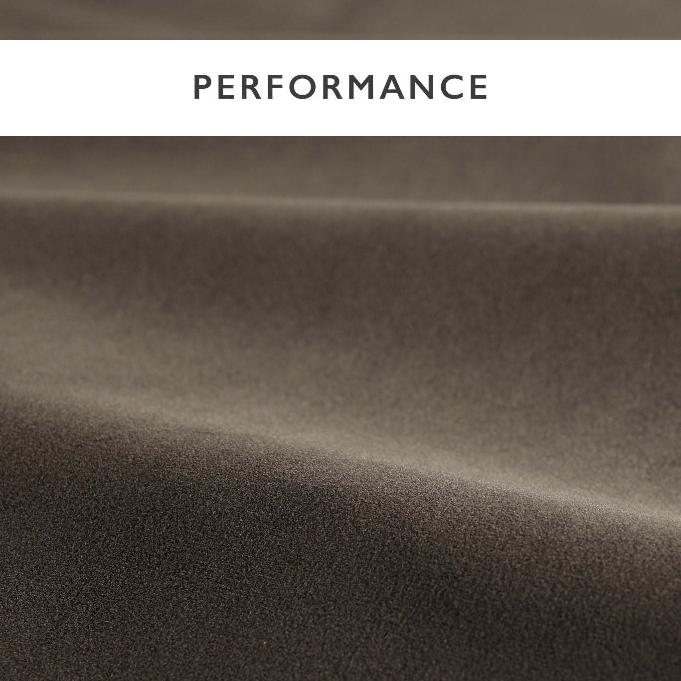 Close-up of chocolate brown velvet fabric with soft folds and subtle pile.