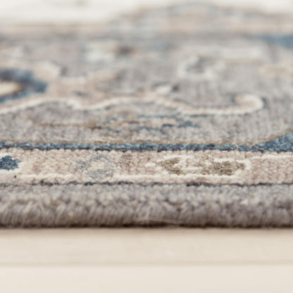Traditional rug, 2' x 3'.