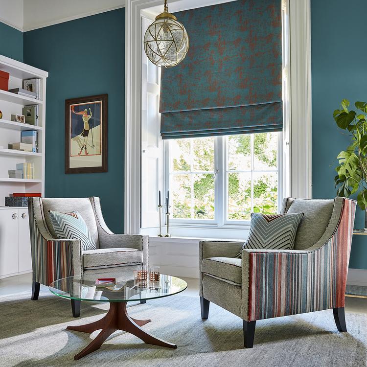 Harlequin Spectro Stripe fabric showing a bold woven stripe design in teal, sedonia rust, and neutral tones — perfect for drapery, cushions, or light upholstery in modern interiors.