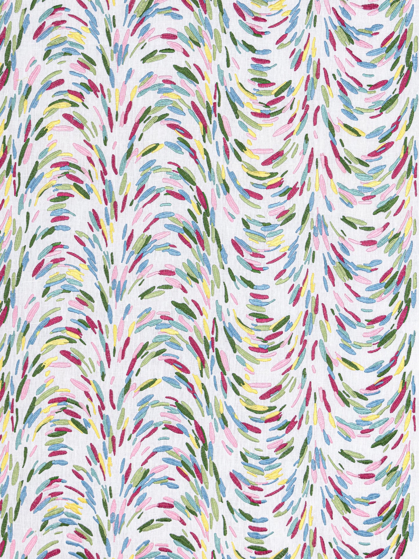 Colorful abstract brushstroke pattern resembling feathers on white fabric; pink, blue, green, yellow; lively textile design.