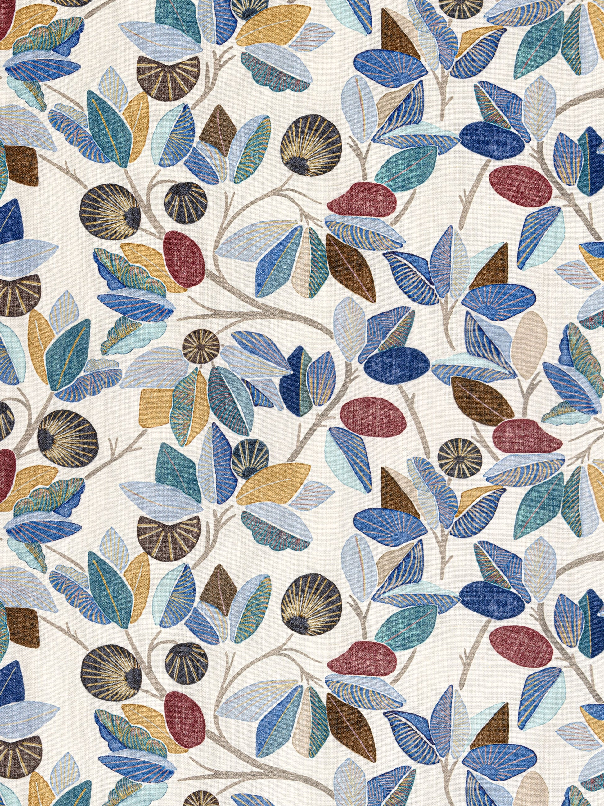 Colorful cobalt botanical fabric with blue, teal, brown and red leaves and round seed-pod accents on a beige background.