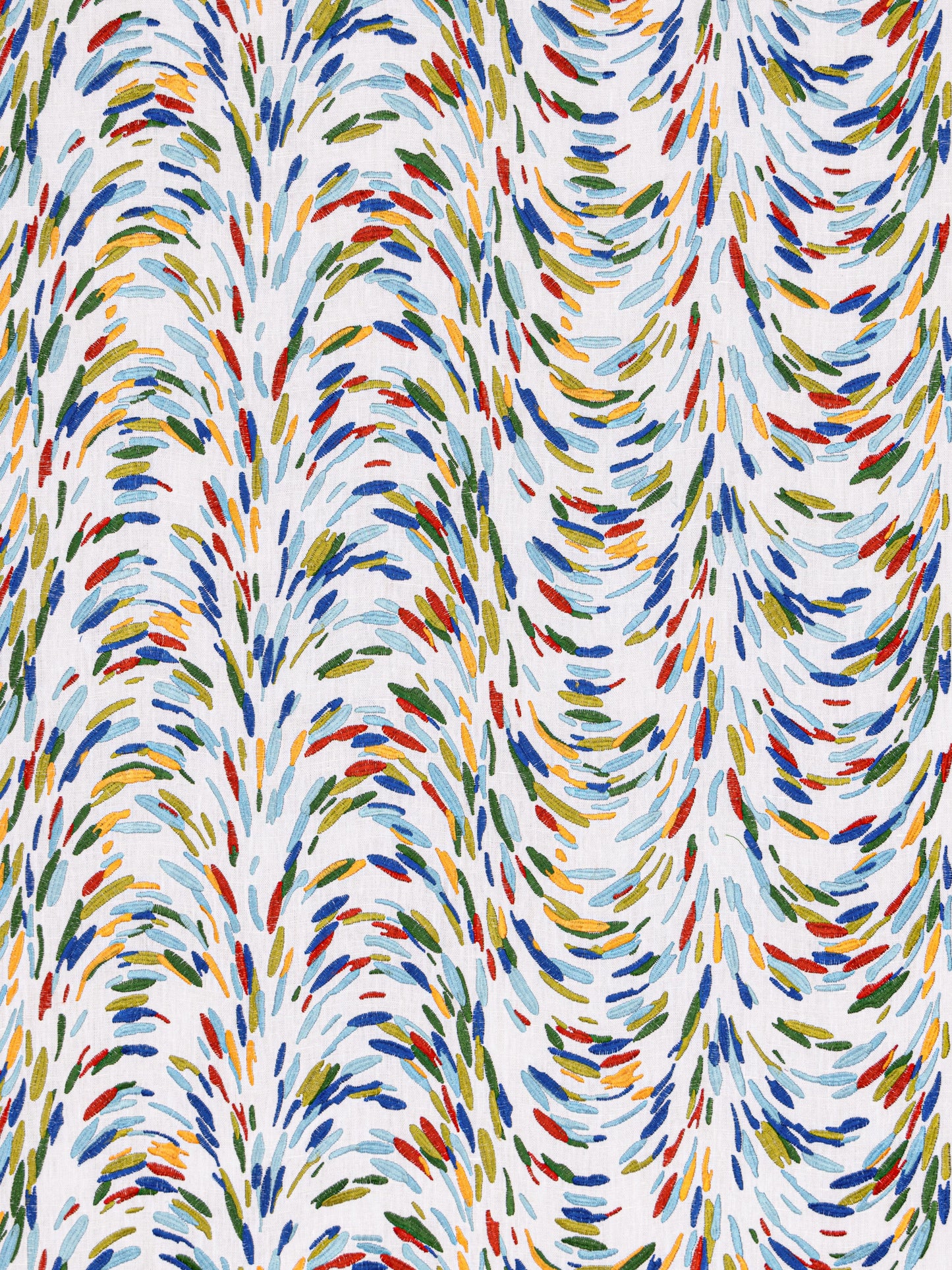 Vibrant multicolor brushstroke pattern with blue, red, yellow, green arcs forming a wavy textile/wallpaper design.