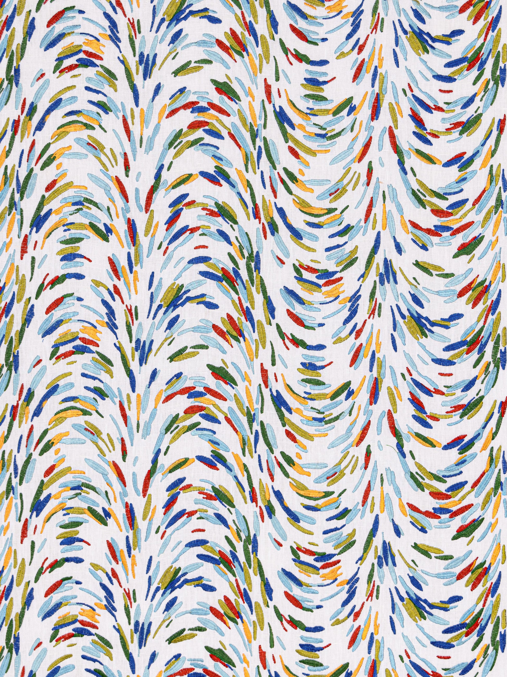 Vibrant multicolor brushstroke pattern with blue, red, yellow, green arcs forming a wavy textile/wallpaper design.