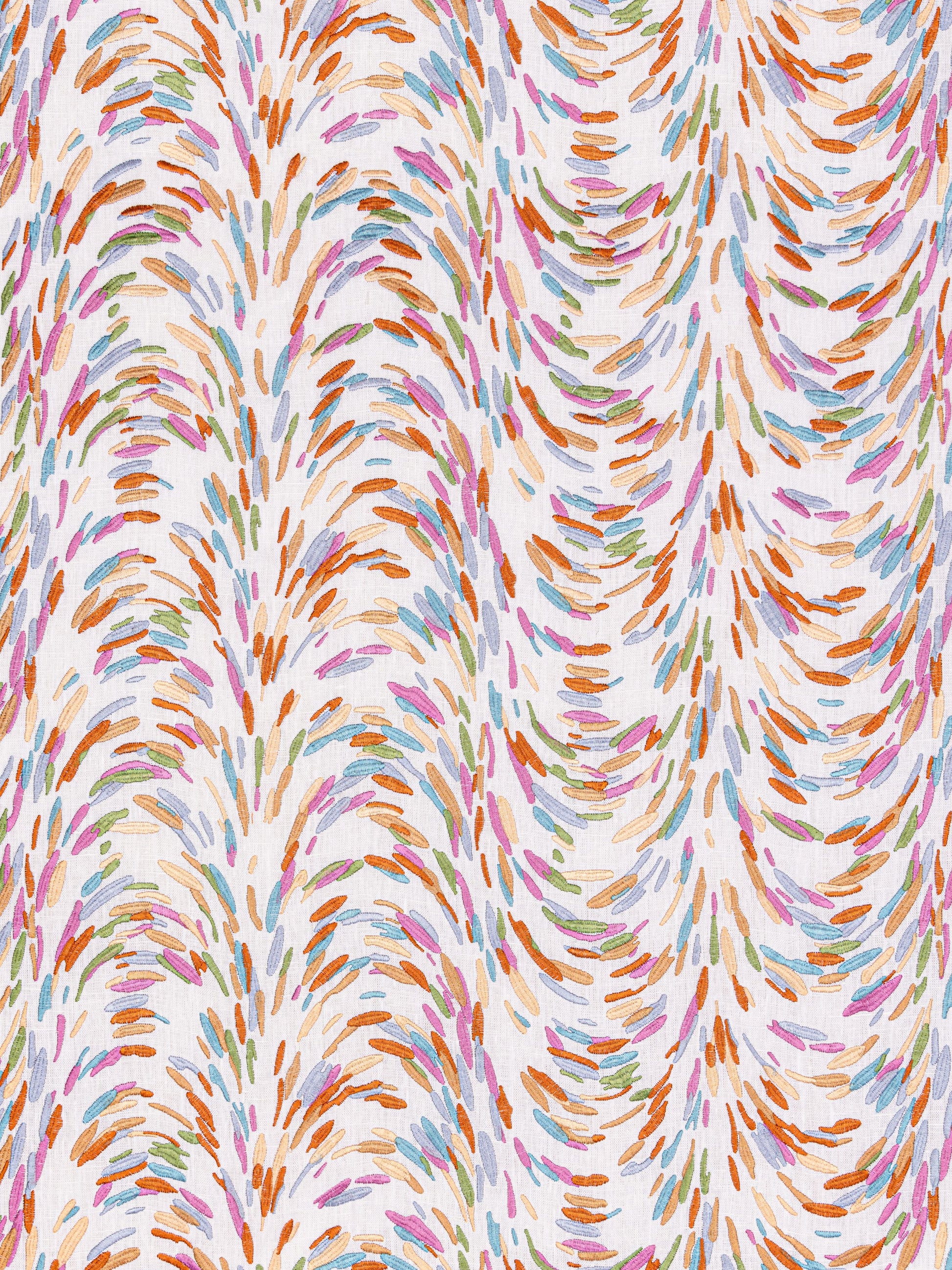 Vibrant abstract textile print with curved brushstroke motifs in orange, pink, blue, green; lively swirling pattern.