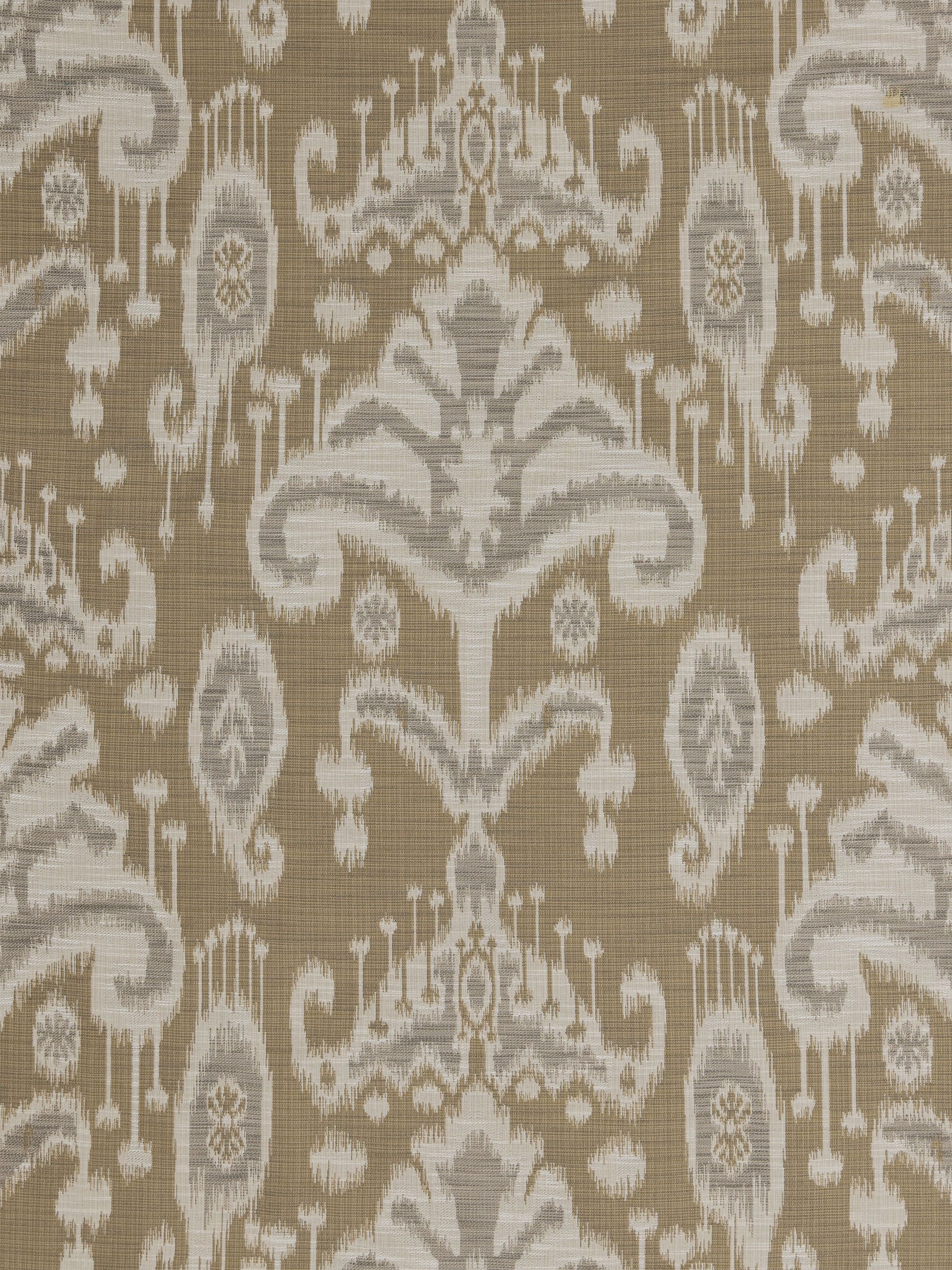 Beige and tan Ikat texture fabric for upholstery or drapery.