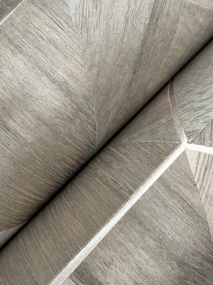 Close-up of brown wood-veneer wallpaper texture.