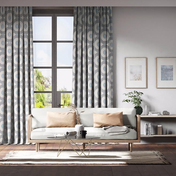 Harlequin Zinnia Tranquility Sky fabric featuring textured circular motifs on a soft blue woven ground; perfect for drapery, upholstery, and elegant home interiors.