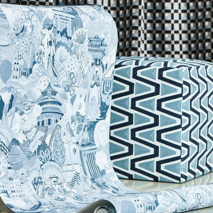 Journey of Discovery Wallpaper in Wild Water and Exhale by Harlequin featuring an ornate hand-painted cartographic design inspired by the Silk Road. Detailed artwork includes mythical dragons, snow leopards, giant pandas, emperors, goddesses, and iconic landmarks in blue-green tones. Luxury designer wallpaper ideal for statement walls, maximalist interiors, dining rooms, living rooms, home libraries, and sophisticated home décor projects.