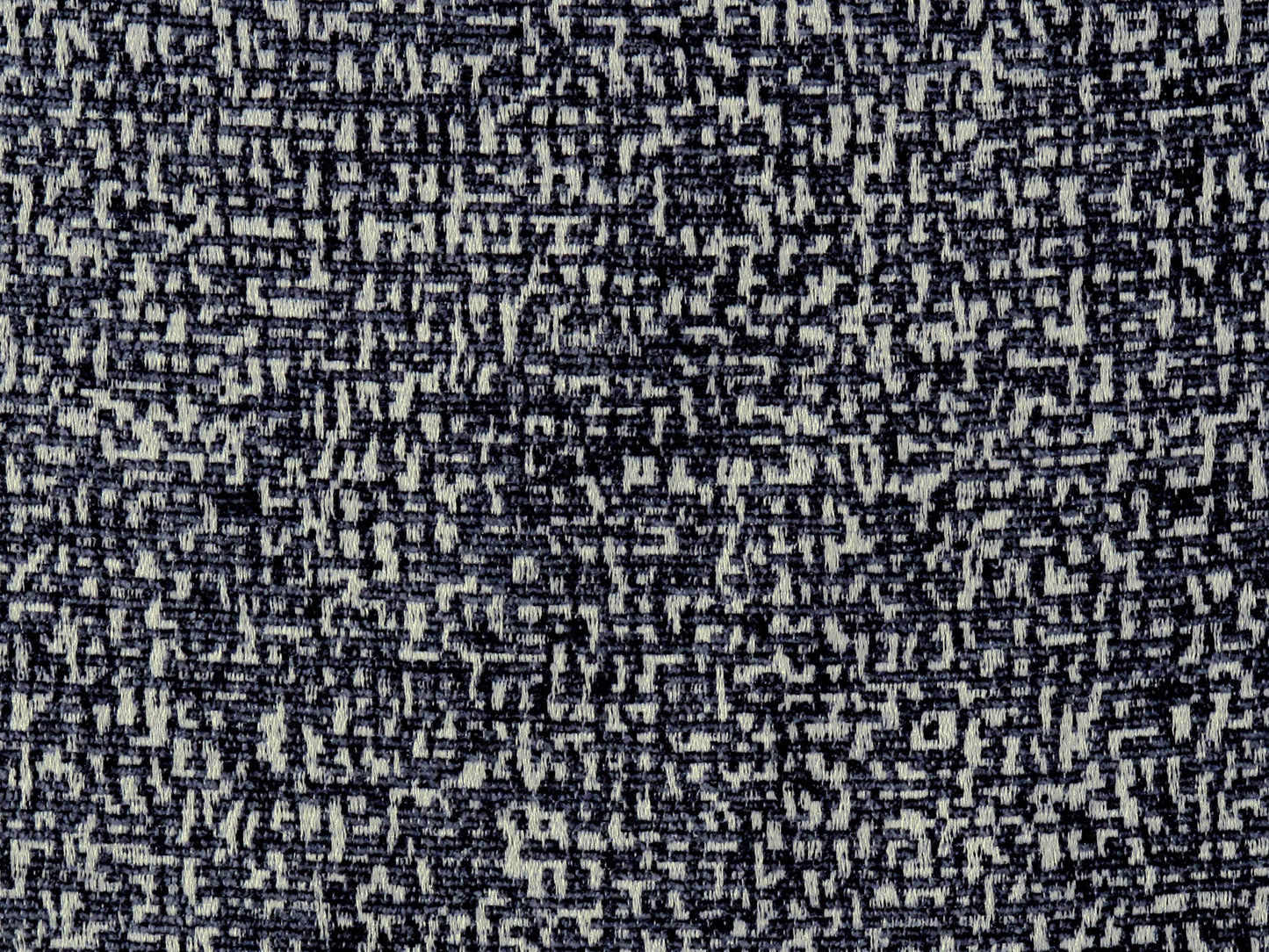Textured charcoal chenille fabric close-up with a tweed-like weave.