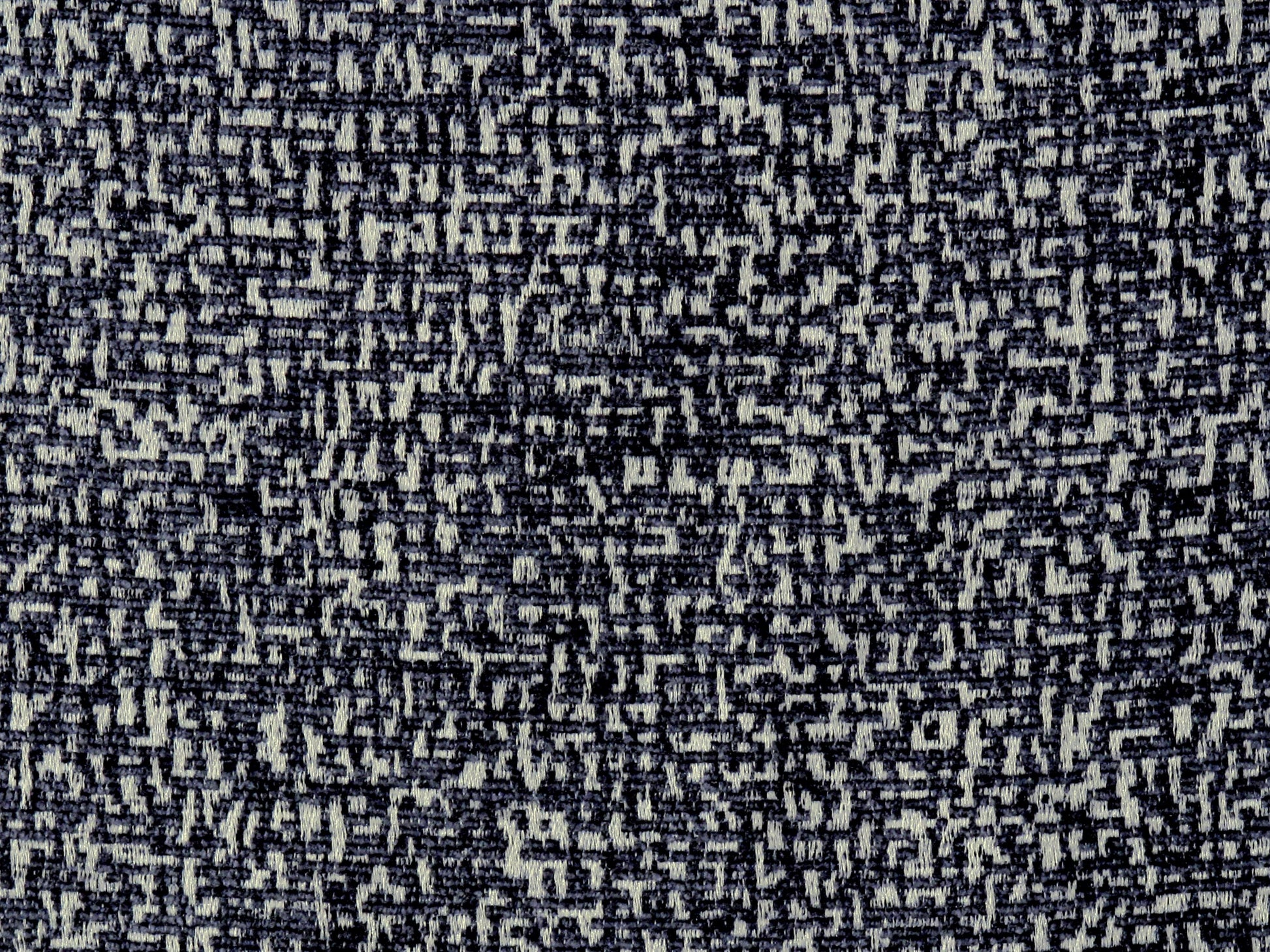 Textured charcoal chenille fabric close-up with a tweed-like weave.