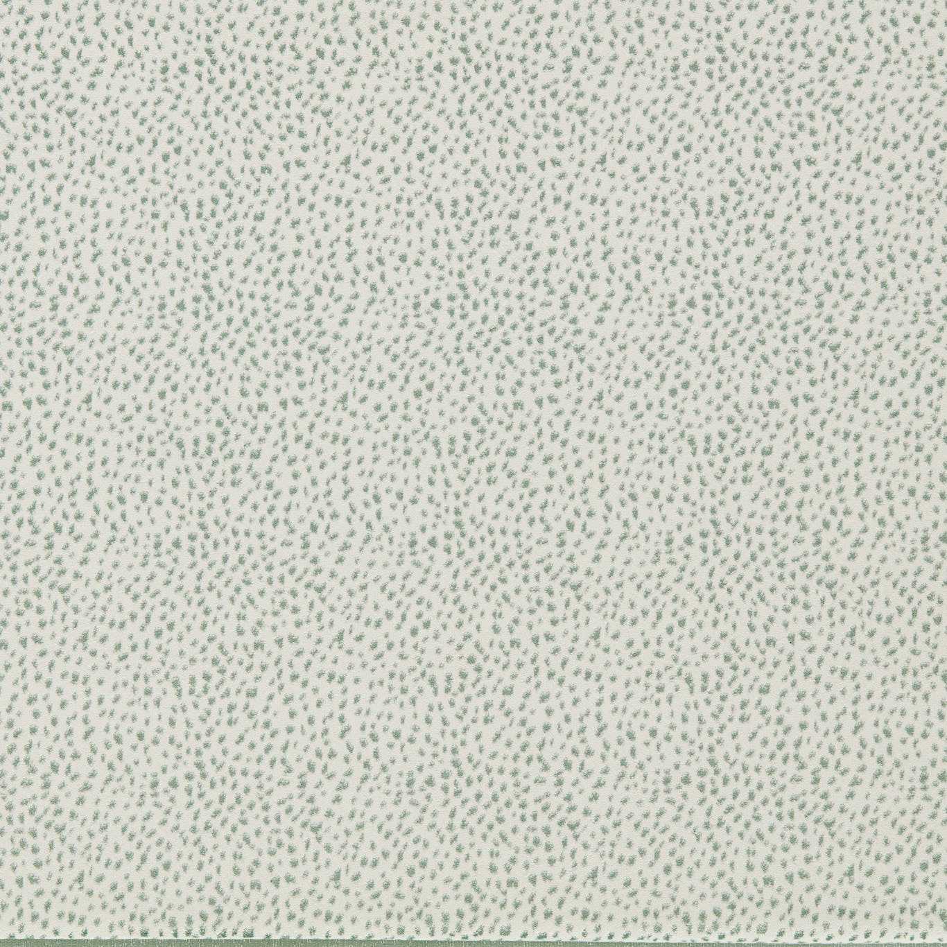 Cream fabric with tiny olive-green speckles in a delicate dotted pattern; versatile, subtle textured look.