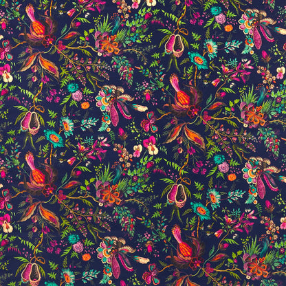 Harlequin Wonderland Floral Velvet Fabric designed by Sophie Robinson featuring vibrant multi-directional floral motifs in Sapphire, Spinel, and Emerald colors. This printed velvet fabric combines archival botanical design with modern bold styling, ideal for upholstery, curtains, blinds, cushions, and luxury interior design projects..