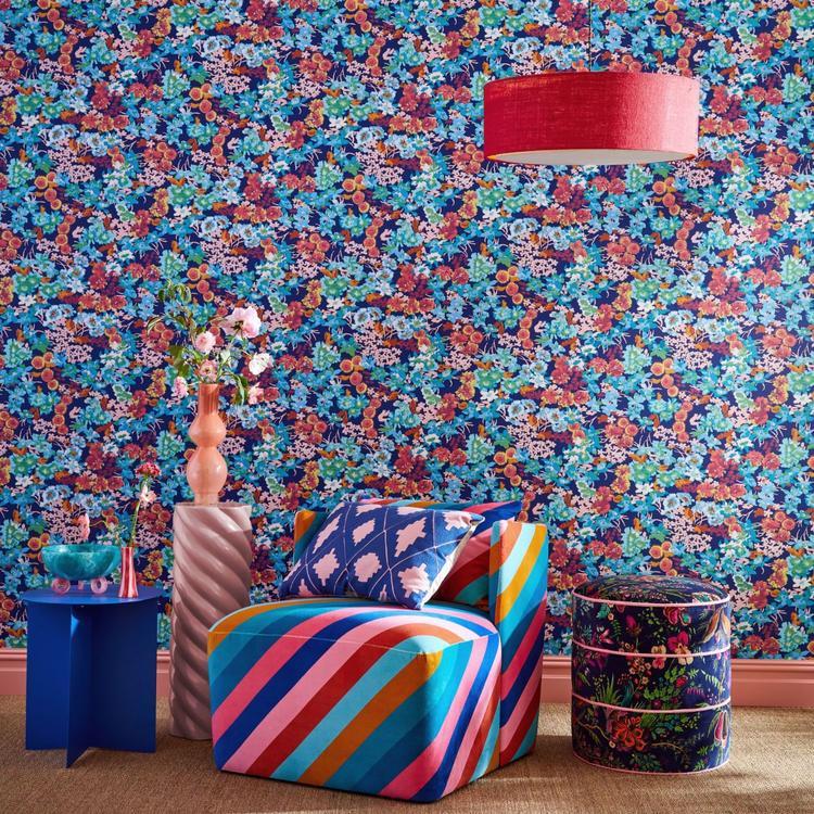 Harlequin Wonderland Floral Velvet Fabric designed by Sophie Robinson featuring vibrant multi-directional floral motifs in Sapphire, Spinel, and Emerald colors. This printed velvet fabric combines archival botanical design with modern bold styling, ideal for upholstery, curtains, blinds, cushions, and luxury interior design projects.