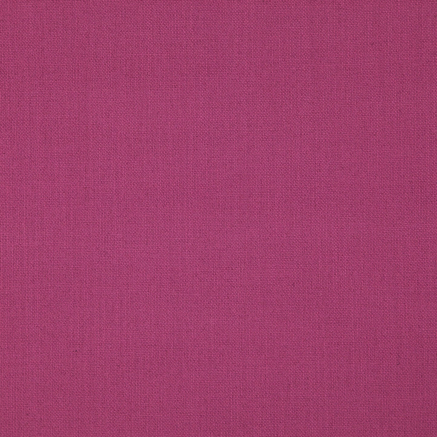 Magenta woven fabric close-up with textured weave.